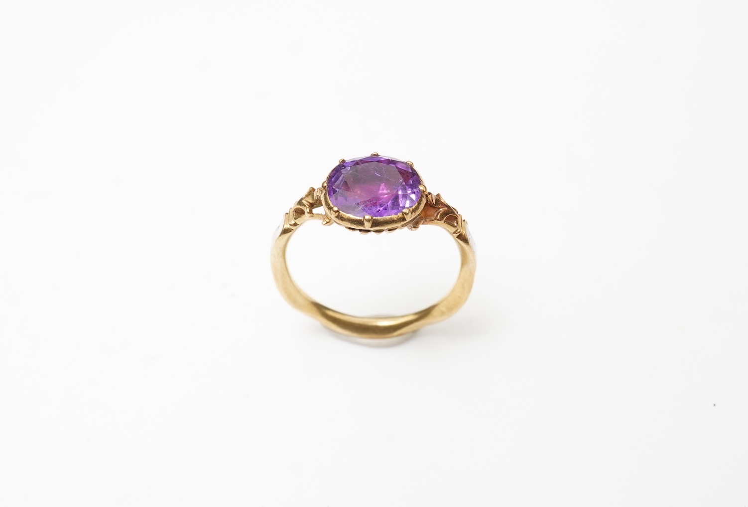 A rare and unusual George III amethyst and enamel mourning ring, late 18th century
